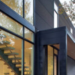 This Black Magic Residence Features AEP Span's Nu-Wave® Siding in a Matte Black finish to create an amazing aesthetic design.