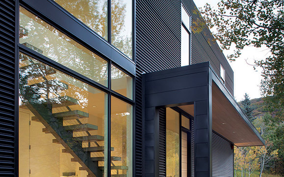 This Black Magic Residence Features AEP Span's Nu-Wave® Siding in a Matte Black finish to create an amazing aesthetic design.