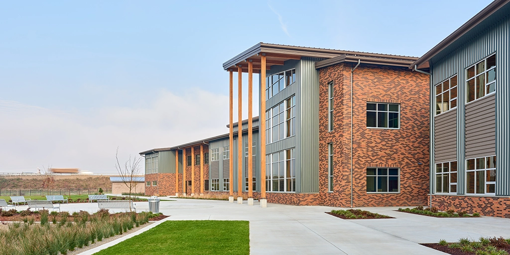 Hamlin Middle School featuring AEP Span Box-Rib in Metallic Champagne and Zactique II Metal Siding