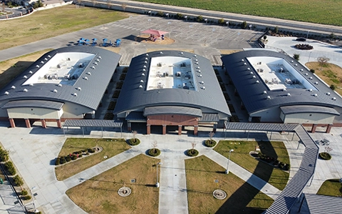 Highgate Elementary School featuring AEP Span's Curved Span-Lok™ Metal Roofing