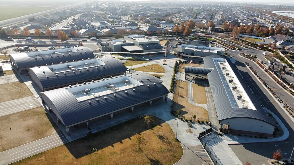 Highgate Elementary School featuring AEP Span's Curved Span-Lok™ Metal Roofing