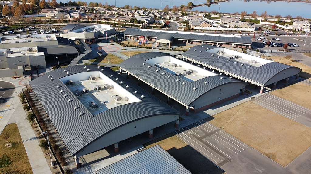 Highgate Elementary School featuring AEP Span's Curved Span-Lok™ Metal Roofing