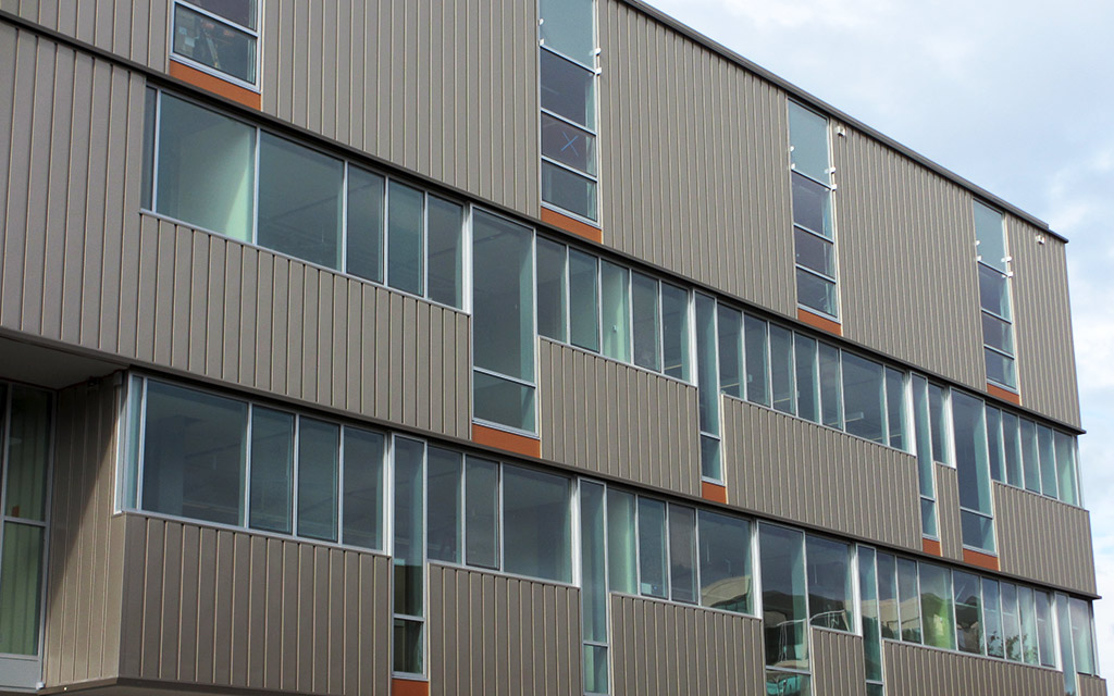 Lane Community College featuring AEP Span's Prestige Series® siding panels in a Cool Metallic Champagne color.