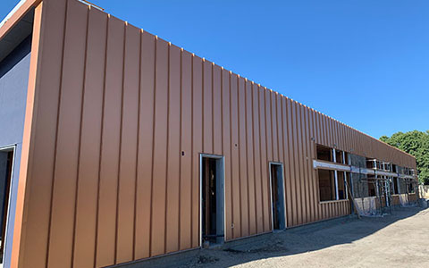 Northpointe Elementary School in Sacramento, CA, featuring metal roofing and siding by AEP Span